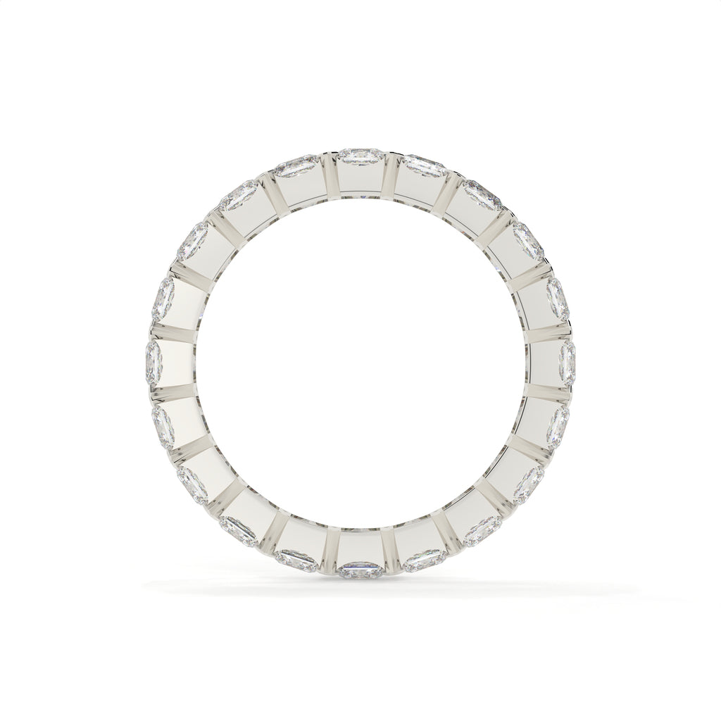 Silver ring with square-cut stones on a white background