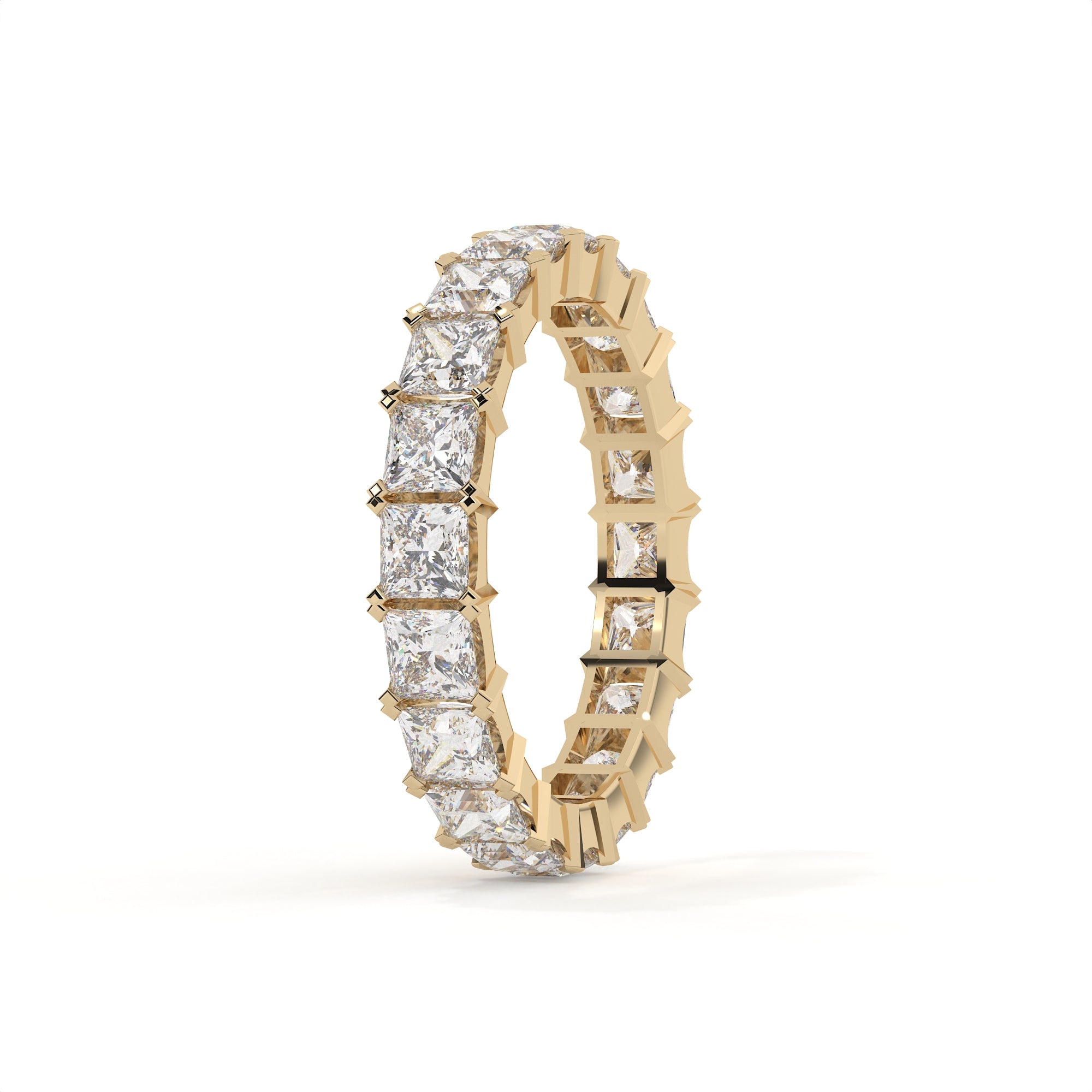 Gold ring with diamond stones on a white background