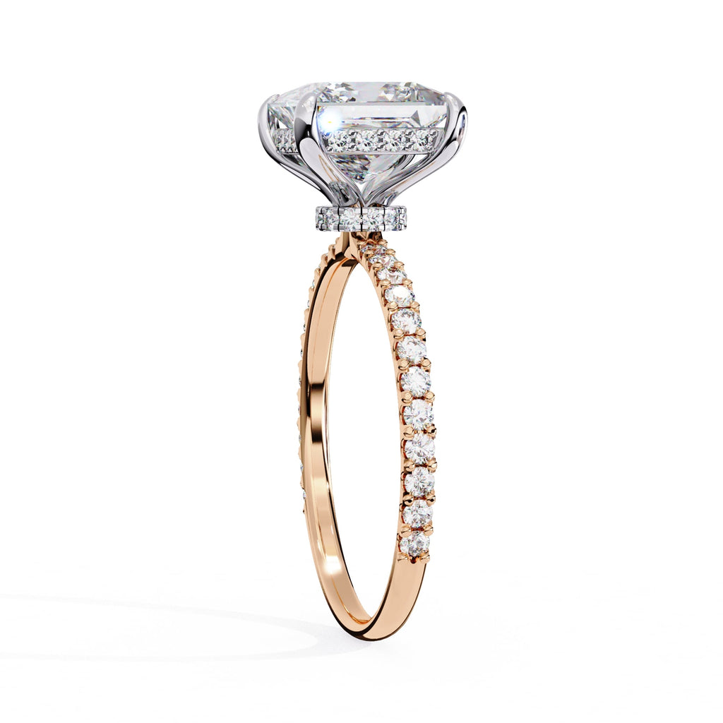 Rose gold ring with a diamond on a white background