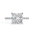 Diamond ring with a square-cut gemstone on a white background