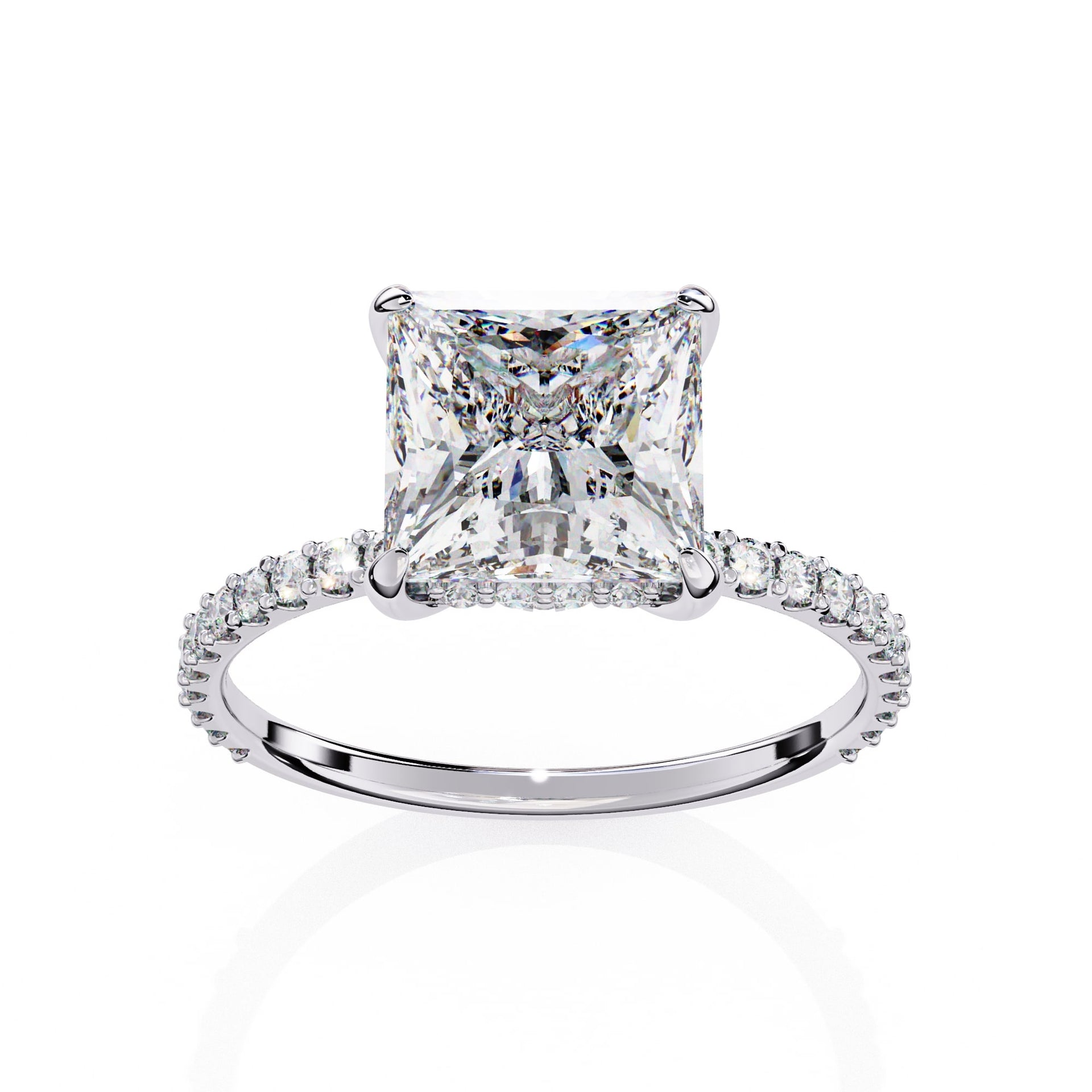 Diamond ring with a prominent princess-cut diamond on a white background
