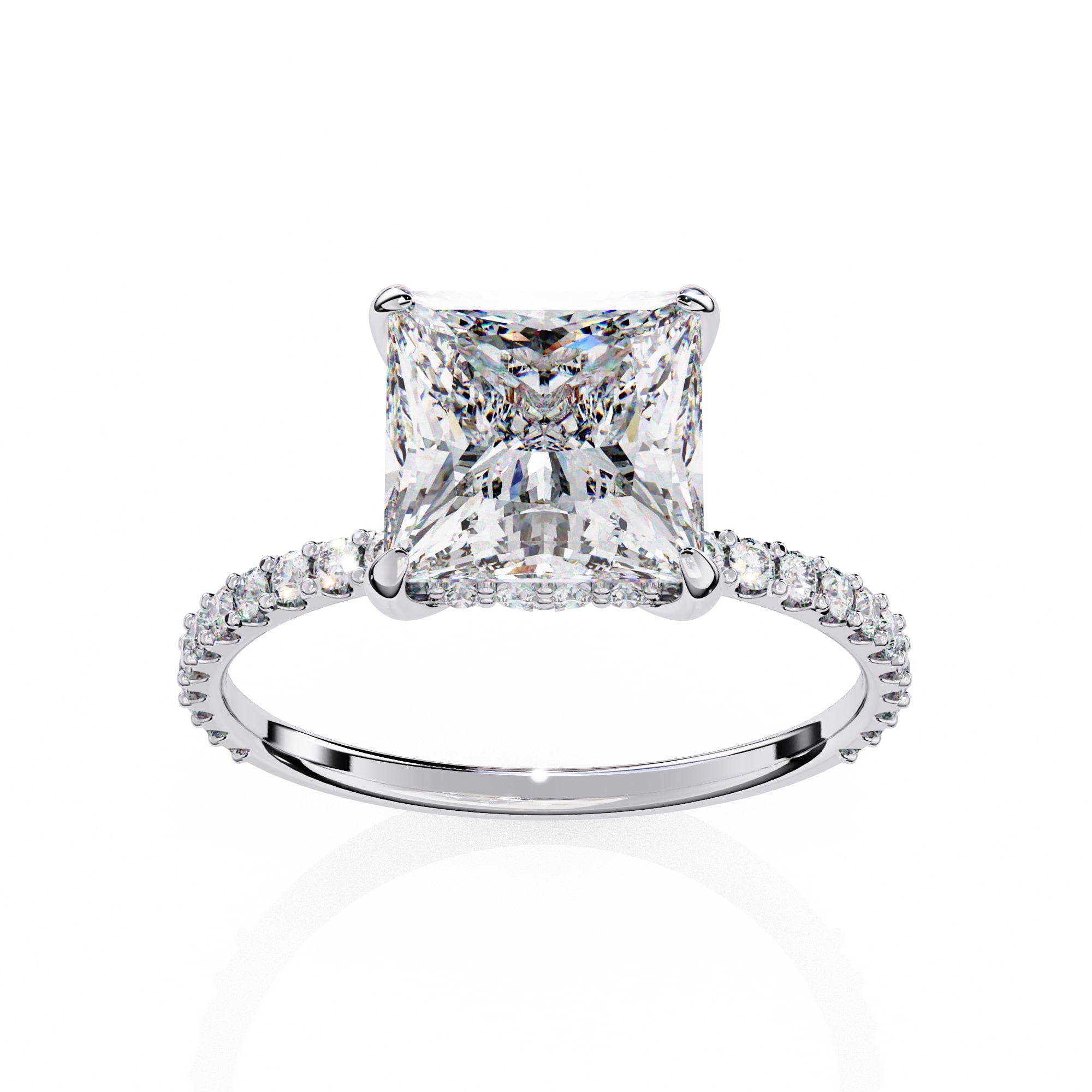 Diamond ring with a prominent princess-cut diamond on a white background