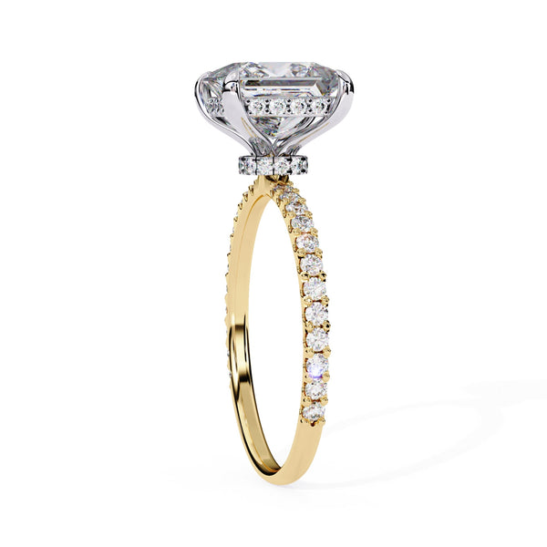 Gold ring with a diamond on a white background