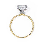 Gold ring with a diamond on a white background