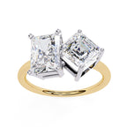 Two diamond rings with gold band on a white background