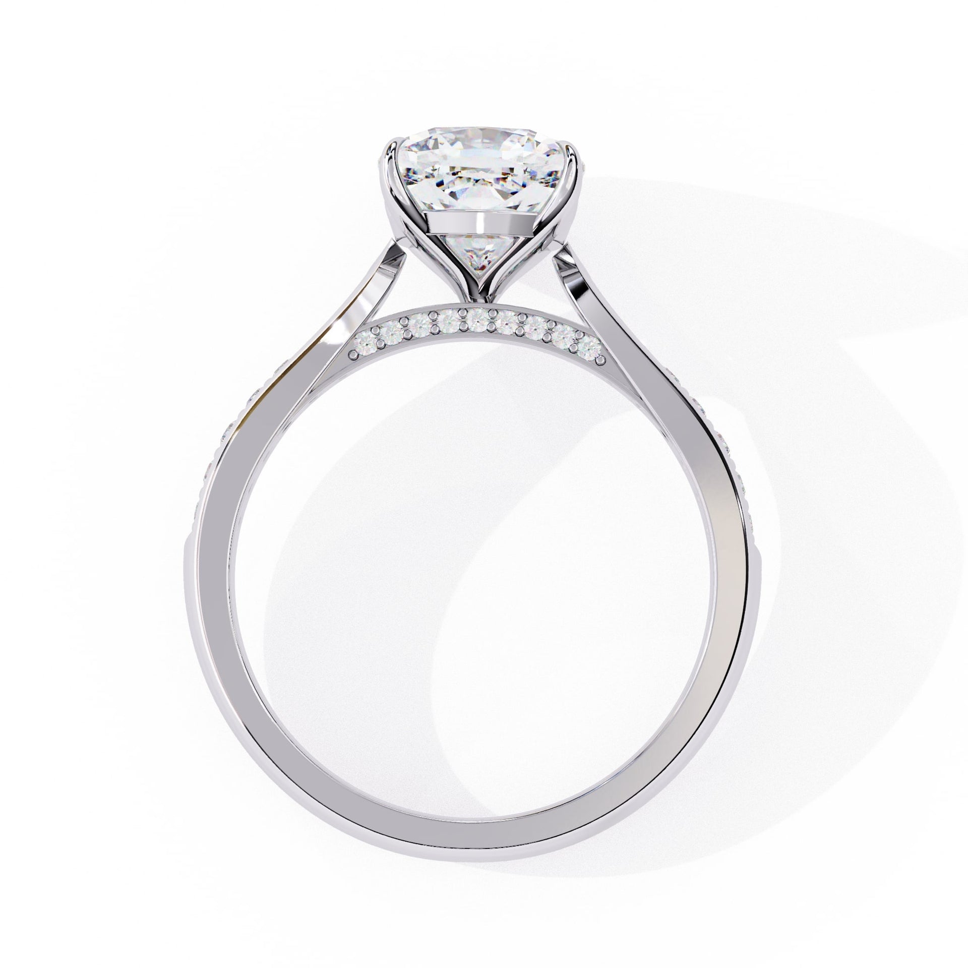 Diamond ring with a heart-shaped center stone on a white background