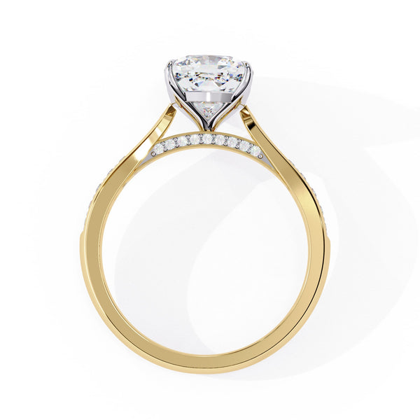 Gold ring with a diamond on a white background