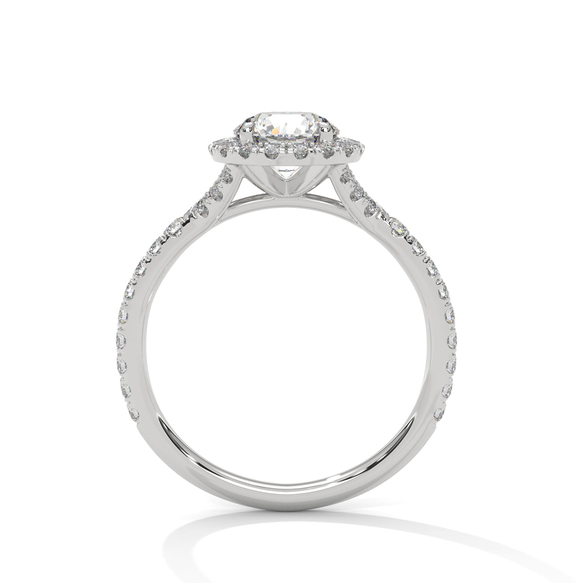 Side profile of a round cut diamond halo engagement ring in white gold with a pave diamond band and raised gallery setting.