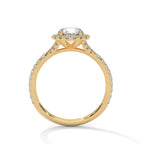 Side profile of a round cut diamond halo engagement ring in yellow gold with a pave diamond band and raised gallery setting.