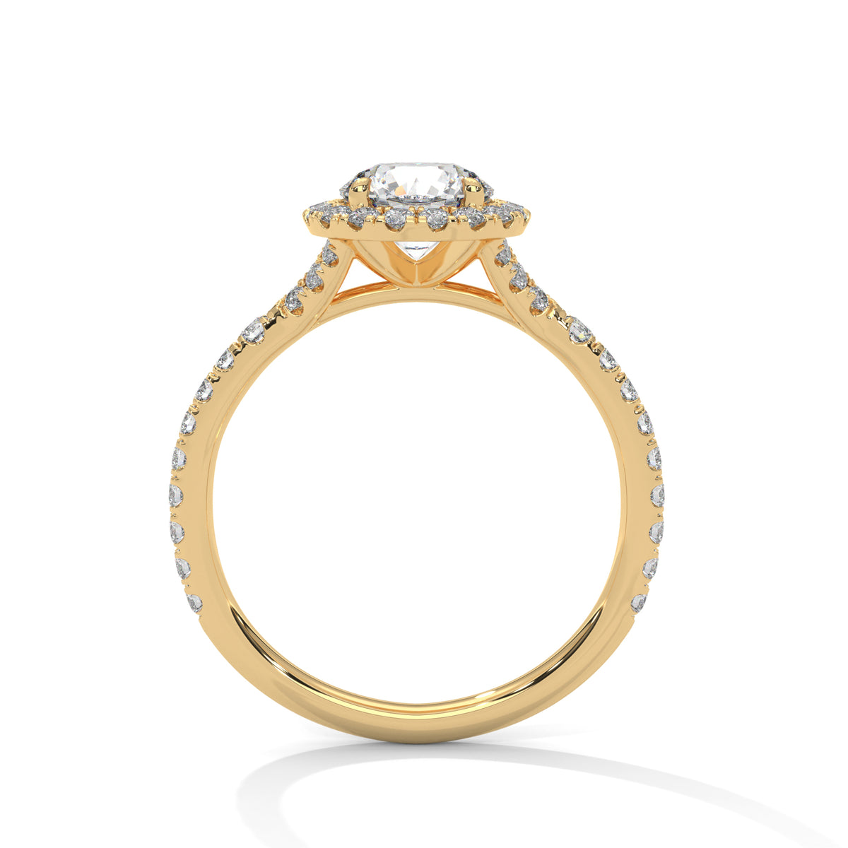 Side profile of a round cut diamond halo engagement ring in yellow gold with a pave diamond band and raised gallery setting.