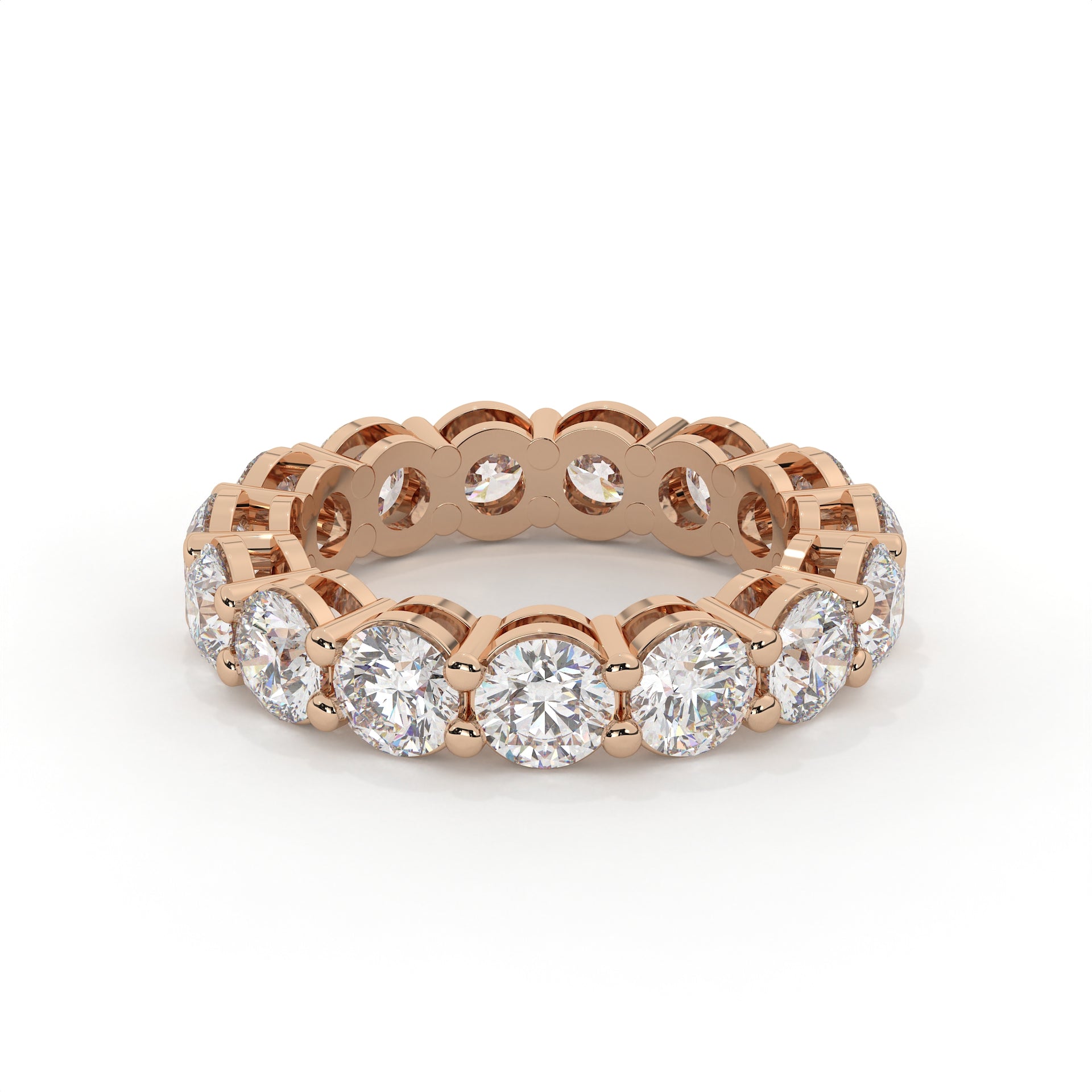 Rose gold ring with diamonds on a white background