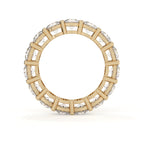Gold ring with diamond accents on a white background