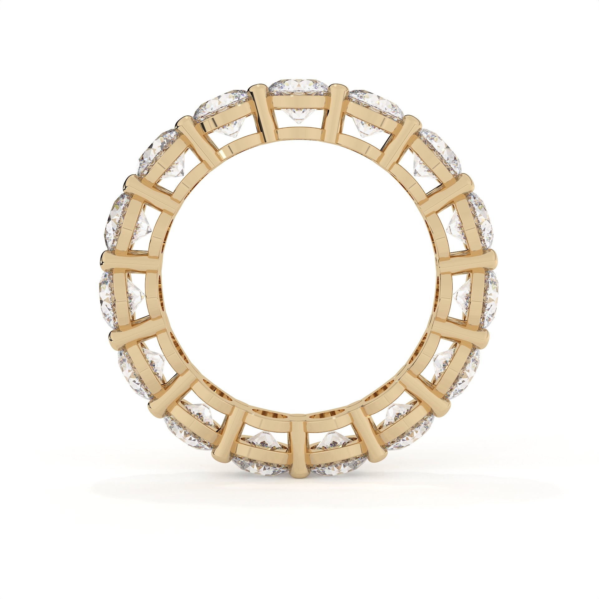 Gold ring with diamond accents on a white background