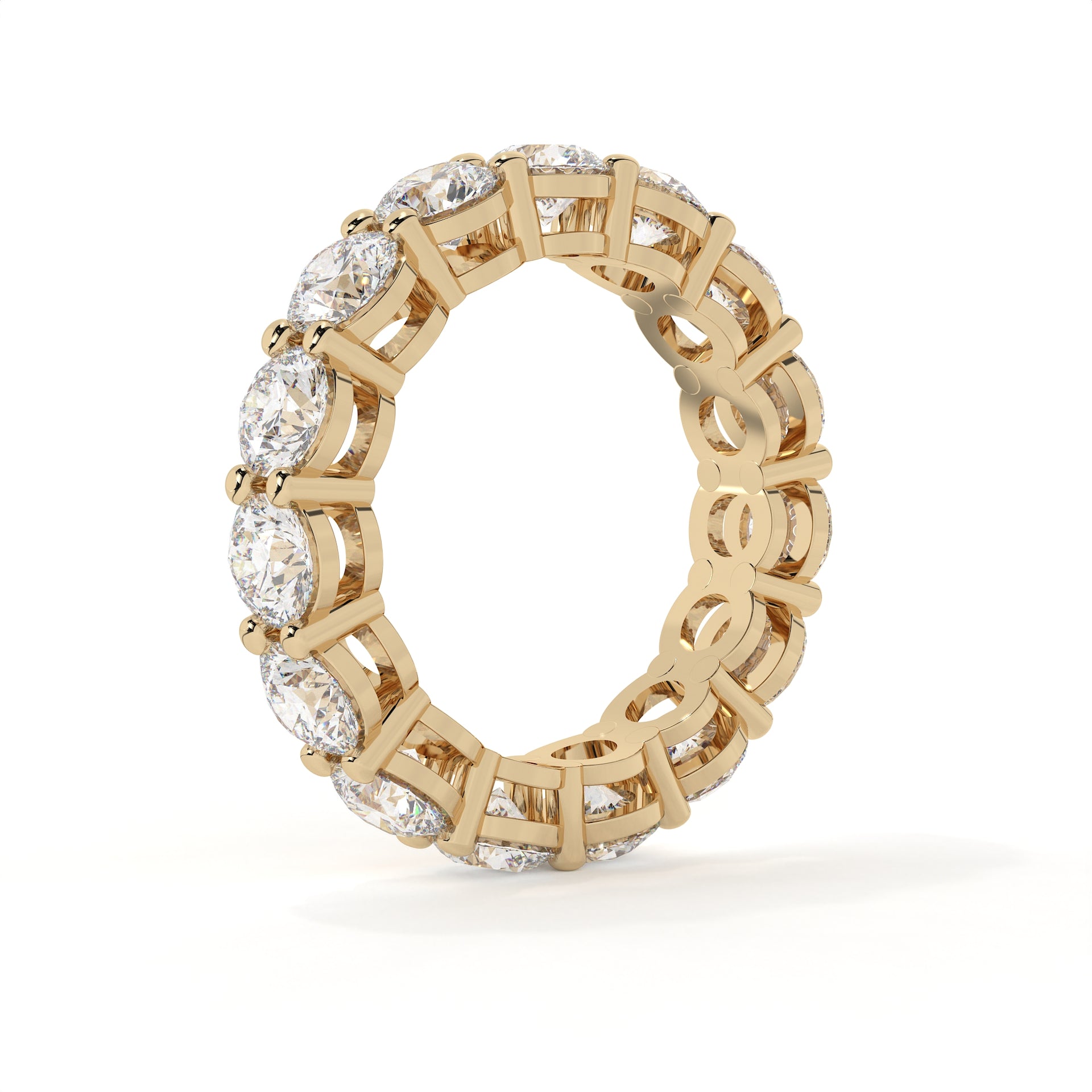 Gold ring with diamond accents on a white background