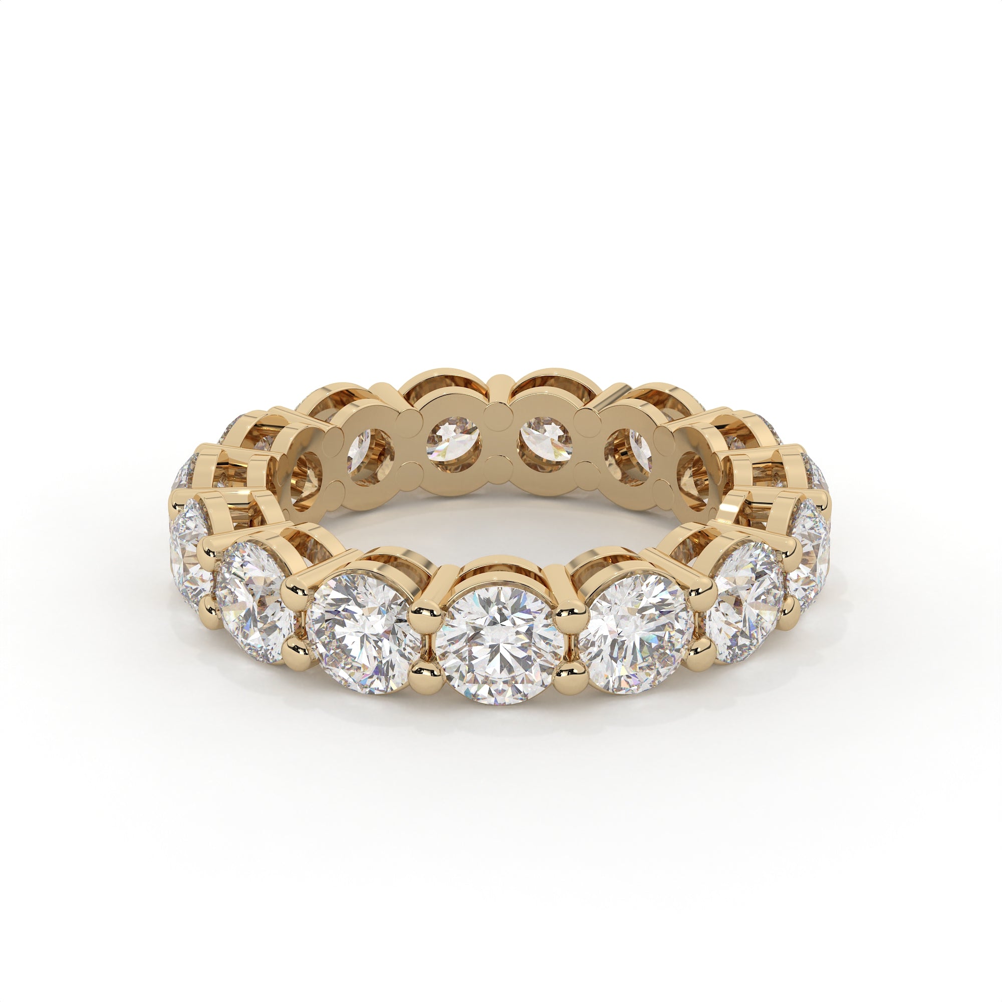 Gold ring with diamonds on a white background
