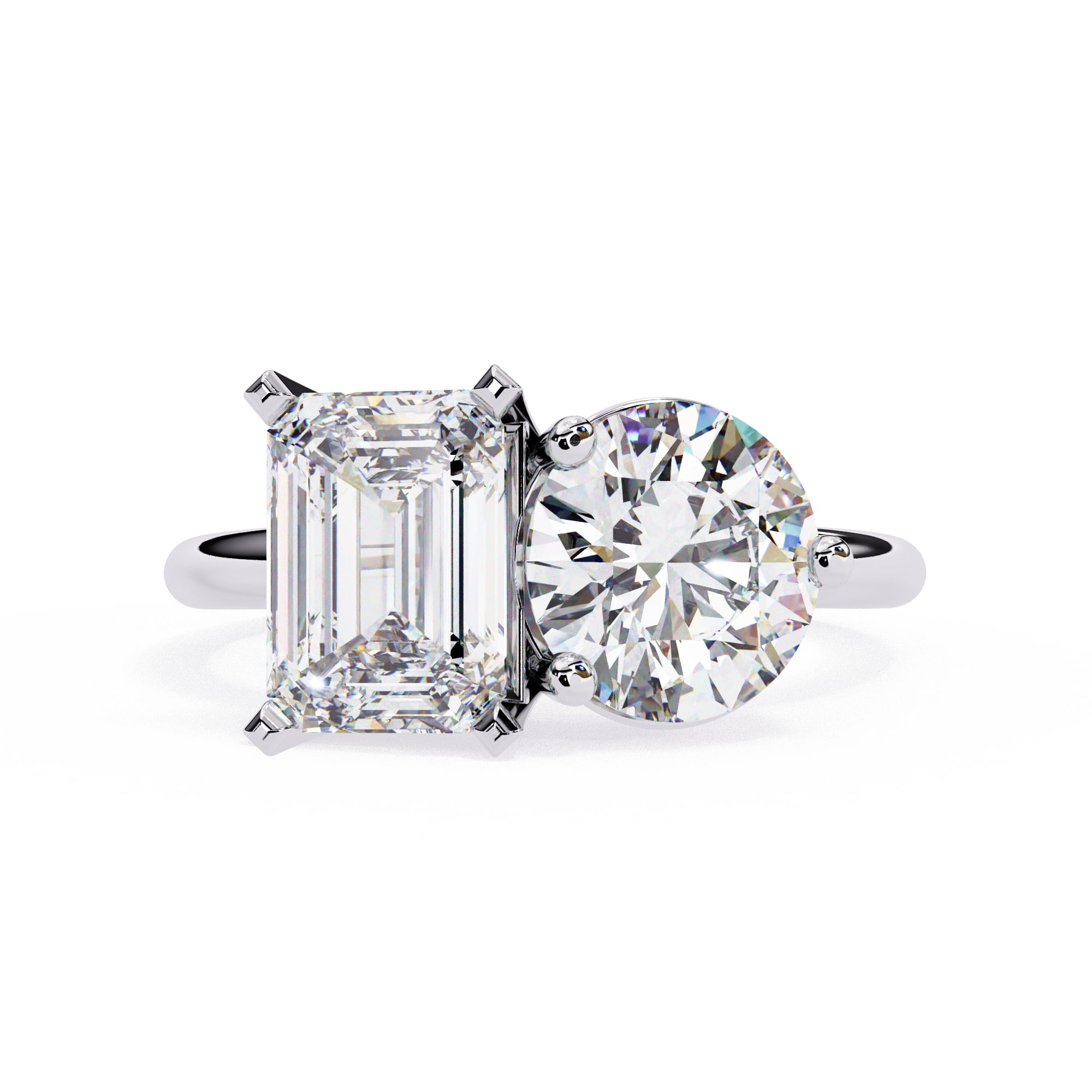 Diamond ring with two different cut diamonds on a white background