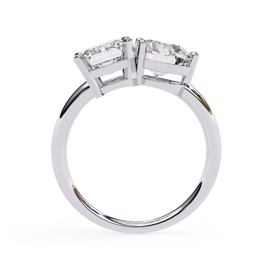 Silver ring with two diamond stones on a white background